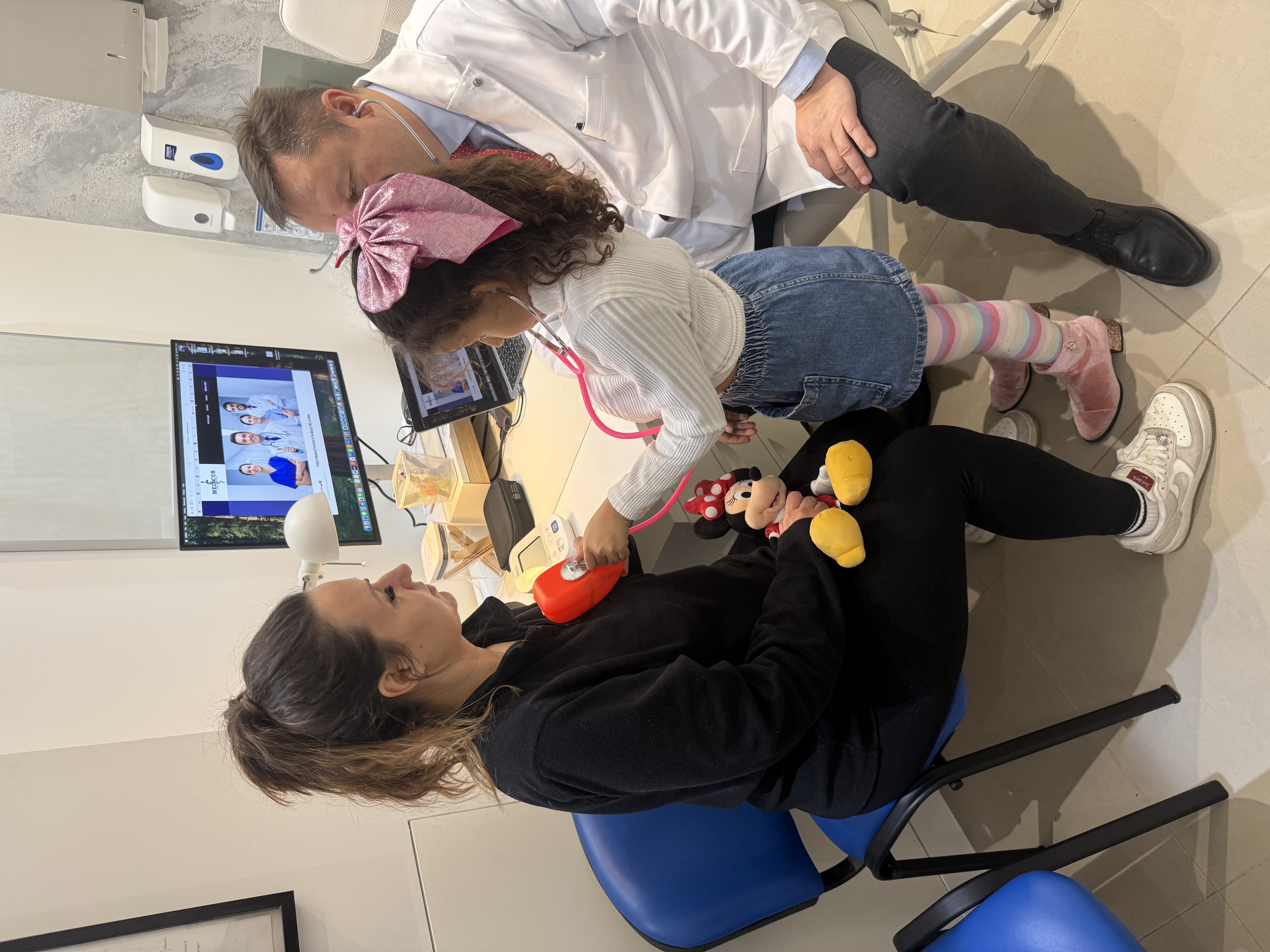 The mother visited the doctor with her child for a medical consultation